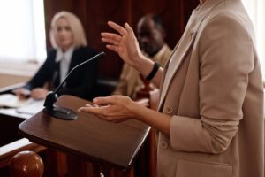 Female speaking during a Clerk Magistrate Hearing that is meant to help establish probable cause for a criminal accusation.